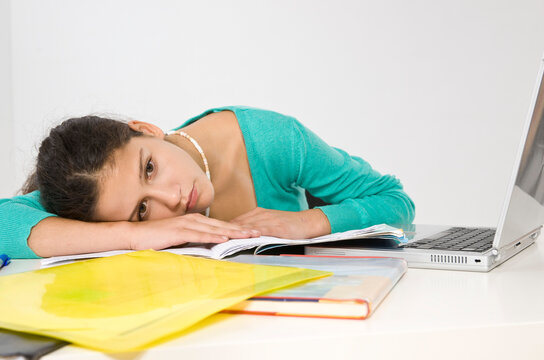 Girl Taking a Break from Homework