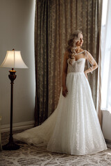 Fototapeta premium portrait of the beautiful bride in the hotel