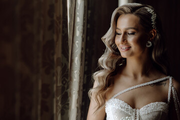 Fototapeta premium portrait of the beautiful bride in the hotel