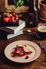 Slice of Strawberry and Sorrel Open Pie on Plate