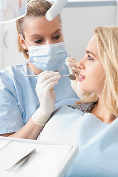 Young Woman getting Check-up at Dentist's Office, Germany