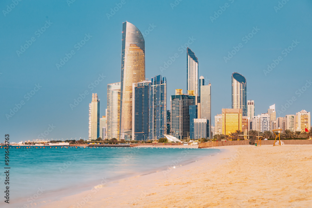 Wall mural panoramic view of stunning sandy beach near corniche seaside embankment with great sunset view of ab - Wall murals