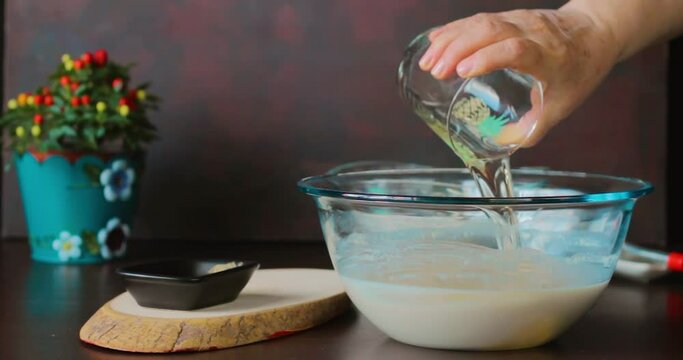 oil, sugar, flour and milk are mixed, dough making