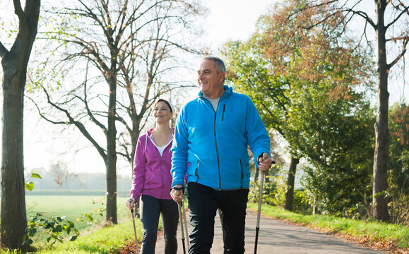 Couple Nordic Walking Outdoors, Mannheim, Baden-Wurttemberg, Germany
