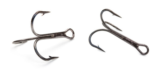 Pair of old rusted fishing hooks isolated on a white background