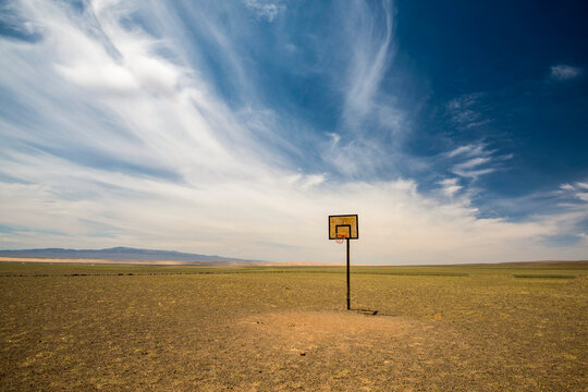 Lone basketball hoop in the Gobi desert; Gobi Desert, Mongolia