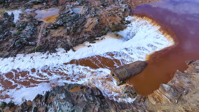 Rio Tinto textures. Aerial view from a drone in the surroundings of the town of Berrocal. Sierra Morena, Gulf of C&aacute;diz, Huelva, Andalusia, Spain, Europe