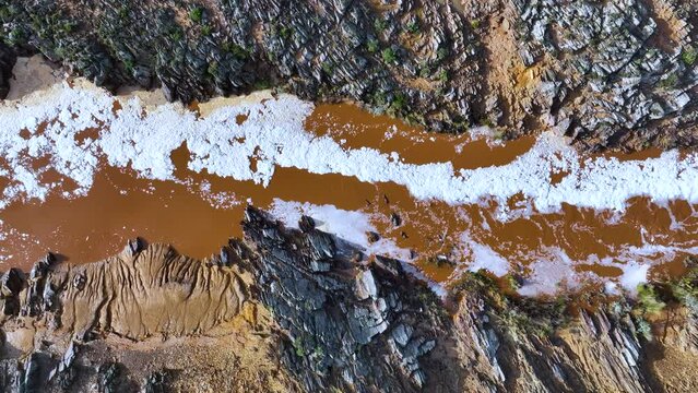 Rio Tinto textures. Aerial view from a drone in the surroundings of the town of Berrocal. Sierra Morena, Gulf of C&aacute;diz, Huelva, Andalusia, Spain, Europe