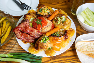 Baked bell peppers stuffed with vegetable and meat...food on wooden table...delicious Mediteranian dish...