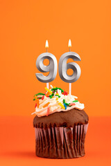 Candle number 96 - Cake birthday in orange background