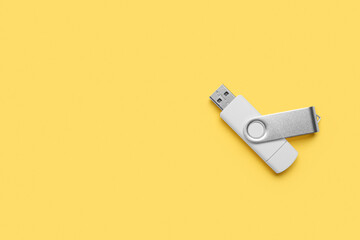 Open USB flash drive on yellow background