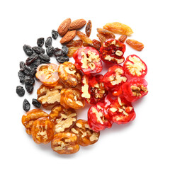 Delicious churchkhela, walnuts, almonds and raisins isolated on white background