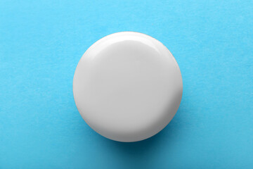 Blank white badge on blue background