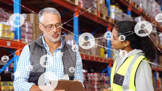 Animation of profiles icons on diverse male supervisor and female worker discussing at warehouse