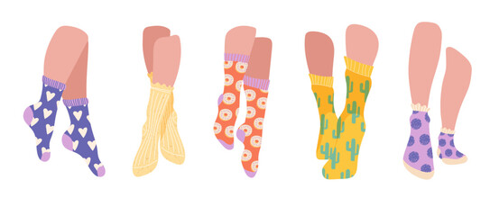 Feet in socks set. Collection of beautiful female legs in stylish and fashionable clothing elements. Autumn and winter accessory. Cartoon flat vector illustrations isolated on white background