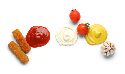Samples of sauces, fish nuggets and vegetables isolated on white background