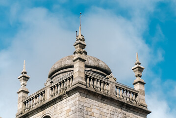 Fototapeta na wymiar Oporto, Portugal. April 12 , 2022: Pelourinho and Porto Cathedral with facade and blue sky.