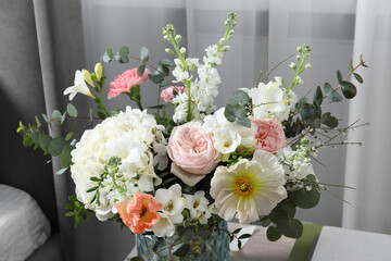 Beautiful bouquet of different fresh flowers indoors, closeup