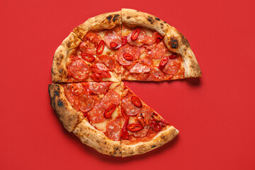 Delicious pepperoni pizza on red background