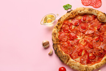 Delicious pepperoni pizza and ingredients on pink background