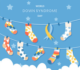World down syndrome day. Socks on ropes with blue ribbon. Greeting card design element. Childhood Illness Awareness month.