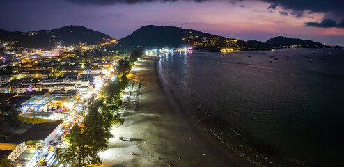 Fototapeta premium Aerial view of Patong beach at night, in Phuket, Thailand