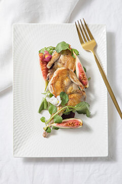 Roasted Quail with a fig and port wine reduction