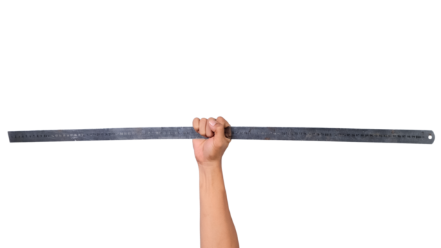 Metal ruler in male hand on white background