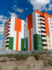 Contemporary architecture. Gable end of multistory apartment house. Urban landscape. Ust-Kamenogorsk, kz. 2021.