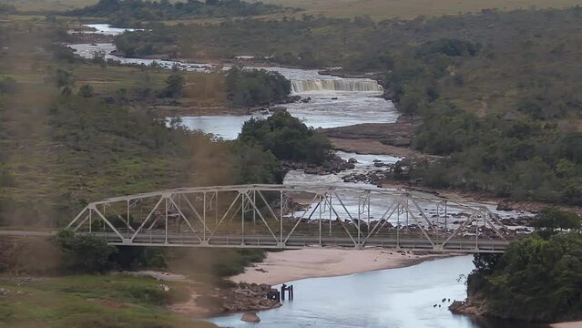 Static distant view of a waterfall and Yuruani river in the Gran Sabana of Venezuela
