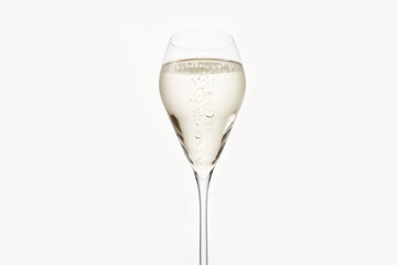 Sparkling wine in stemmed glass holiday template. Bottle of champagne on white isolated.