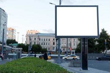 Billboard free for advertising on the city square. Mock-up.