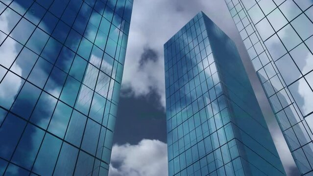 Animation of low angle view of tall buildings against clouds in the sky