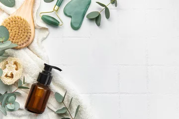 Foto auf Acrylglas Spa Spa treatment concept. natural spa cosmetics products with eucalyptus oil,, massage brush, eucalyptus leaf.