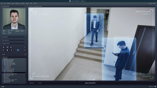 Playback office CCTV camera on computer. Workers walk in business office corridor. AI software with facial recognition and personal profiles. Security camera with digital face scanning analyze system. - Powered by Adobe