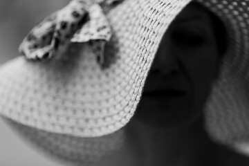 Woman with summer hat in closeup