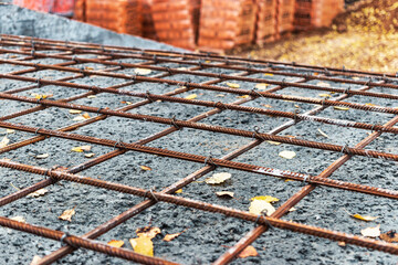 Installation of reinforcement and formwork for reinforced concrete by builders for the manufacture...