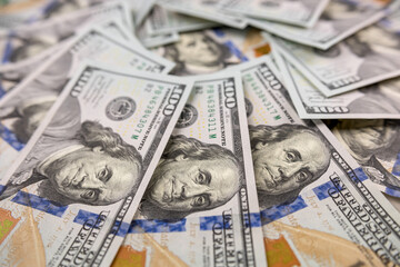 rich conept background of 100 us dollar banknotes