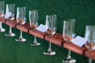 Stand for glasses. A luxurious wedding ceremony. Romantic wedding ceremony. Champagne glasses on a...
