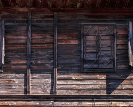 windows on the vintage wooden wall. ancient architecture