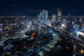 Fototapeta na wymiar Nagoya station and its vicinity downtown area with high rise buildings at night.