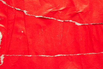Old grunge ripped torn red paper poster surface texture background