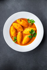 quenelle meat tomato sauce meal food snack on the table copy space food background rustic top view