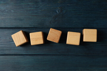 Blank wooden cubes for different concepts, top view