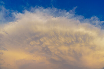 Large unusual cloud in the blue sky
