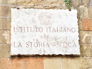 Marble plate of the Istituto Italiano per la Storia antica in Rome, Italian Institute promoting and...