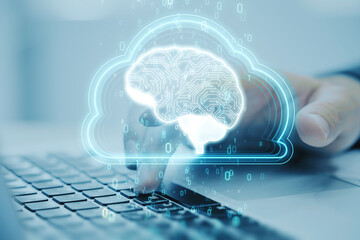 Artificial Intelligence hardware concept. Close up of man hand using laptop with glowing cloud brain and circuit on background. Ai trading, machine learning, technology background. Double exposure.