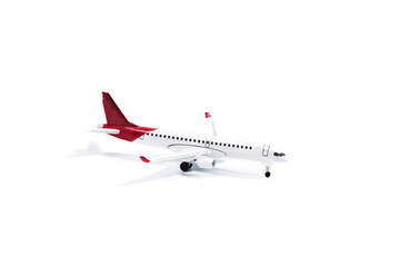 Toy plane on a white background. Travel concept