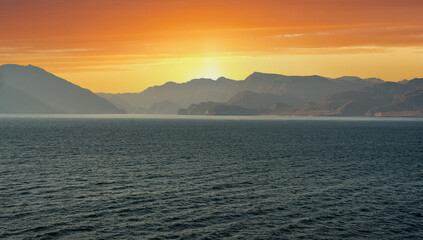 Sunset in Sinai Mountains, Oman. panorama of Sinai mountains on stunning sunset. colorful...