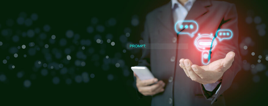 A chatbot held by a businessman, equipped with a text input box to collect user prompts and inputs